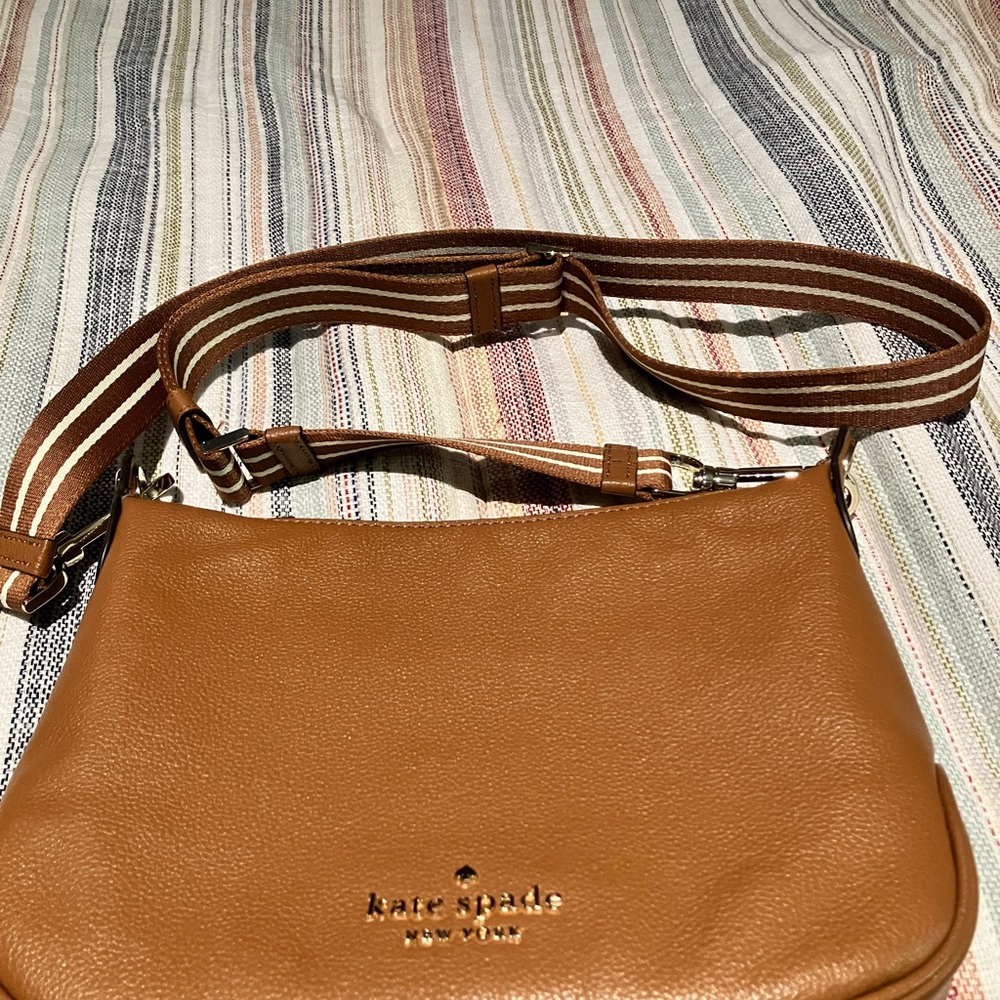 Kate Spade caramel colored leather crossbody.  Never used.